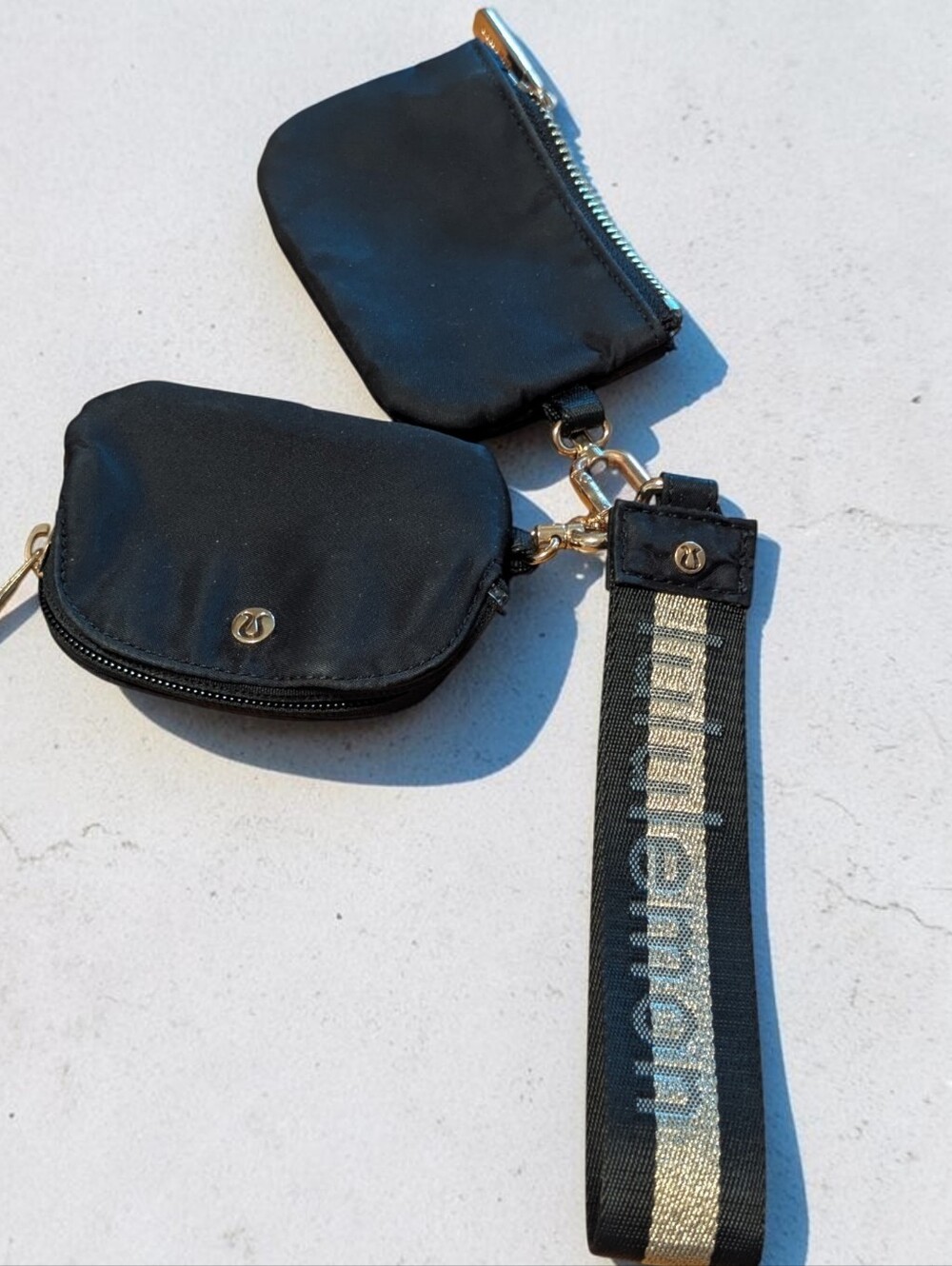 Lululemon athletica Black Double Pouch Wristlet with Gold Accents